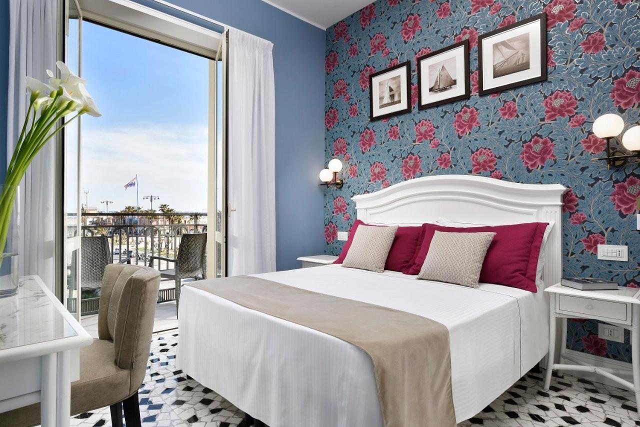 Chambre Double ou Lits Jumeaux avec Balcon - Vue Partielle sur Mer