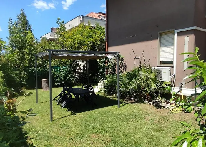 Beach House Garden, 300m dal mare, wifi, bici, giardino privato, clima