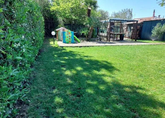 Casa con giardino